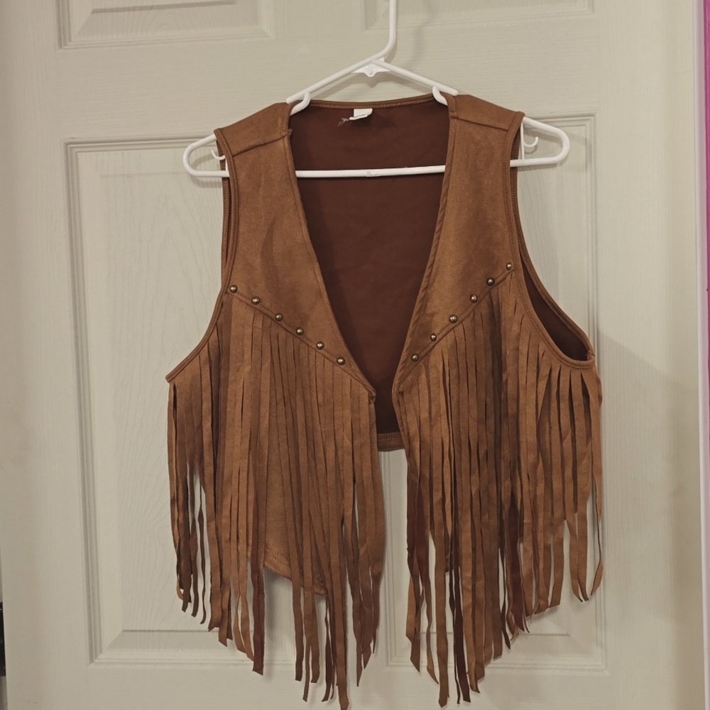 XL Leather vest, it runs small, more like a large. Never been warn.
